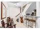 Basement foyer with staircase and custom wet bar, perfect for entertaining guests in style at 248 Montrose Dr, Mcdonough, GA 30253
