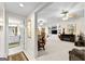 Finished basement leading to a bathroom, featuring built-in shelving and providing ample entertainment space at 248 Montrose Dr, Mcdonough, GA 30253