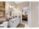 Bathroom featuring granite countertop, updated fixtures, and an ensuite bedroom entrance at 248 Montrose Dr, Mcdonough, GA 30253