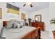 Cozy bedroom with gray comforter and a wooden dresser for ample storage at 248 Montrose Dr, Mcdonough, GA 30253
