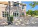 Elegant building entrance with brick facade, large windows, and manicured landscaping with a stone path at 248 Montrose Dr, Mcdonough, GA 30253