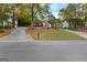 Traditional brick home with mature landscaping, circular drive, and welcoming curb appeal at 248 Montrose Dr, Mcdonough, GA 30253