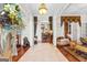 Inviting foyer featuring tile flooring, columns, and a decorative lion statue at 248 Montrose Dr, Mcdonough, GA 30253