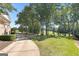 View of the golf course and cart path from a path near the clubhouse at 248 Montrose Dr, Mcdonough, GA 30253