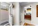 Hallway view showing the entrance to a bedroom with gray bedding at 248 Montrose Dr, Mcdonough, GA 30253