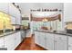 Kitchen leading to breakfast area and dining room at 248 Montrose Dr, Mcdonough, GA 30253