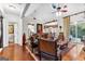 Cozy living room features vaulted ceiling, hardwood floors and neutral decor at 248 Montrose Dr, Mcdonough, GA 30253