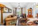Bright living room with hardwood floors, stylish furnishings, and natural light at 248 Montrose Dr, Mcdonough, GA 30253