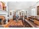 Inviting living room with fireplace, hardwood floors, and stylish decor at 248 Montrose Dr, Mcdonough, GA 30253