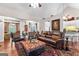 Open living room with hardwood floors, stylish furniture, and bright ambiance at 248 Montrose Dr, Mcdonough, GA 30253