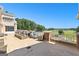 A large patio features an outdoor fireplace and golf course views, perfect for outdoor relaxation and entertaining at 248 Montrose Dr, Mcdonough, GA 30253