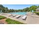 Refreshing community pool with lounge chairs and umbrellas, offering a relaxing outdoor experience at 248 Montrose Dr, Mcdonough, GA 30253