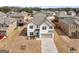 Beautiful home boasts a manicured lawn and a spacious driveway in a friendly neighborhood at 445 Sawmill Trce, Hampton, GA 30228
