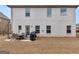 Spacious backyard featuring a patio area, perfect for outdoor entertaining at 445 Sawmill Trce, Hampton, GA 30228