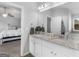 Bathroom featuring a double vanity with granite countertops, and bedrrom view at 445 Sawmill Trce, Hampton, GA 30228