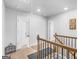 Hallway features two doorways and a bird cage at 445 Sawmill Trce, Hampton, GA 30228