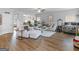 Cozy living room with plush seating, hardwood floors, and an open layout at 445 Sawmill Trce, Hampton, GA 30228