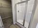 Bathroom showing a large glass and metal-framed shower stall and open walk-in closet at 746 S. Bethany Rd., Locust Grove, GA 30248