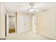 Bedroom featuring neutral walls, plush carpet, and a ceiling fan at 2770 Stonehill Way, Cumming, GA 30041
