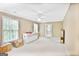 Expansive bonus room with neutral carpet, white trim, and ample natural light at 2770 Stonehill Way, Cumming, GA 30041