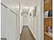Bright hallway features updated trim, lighting, and access to multiple rooms at 306 N Meade Dr, Peachtree City, GA 30269
