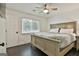 Relaxing main bedroom with ceiling fan and plenty of natural light from a window at 306 N Meade Dr, Peachtree City, GA 30269