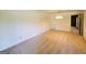 Carpeted dining room with simple lighting and neutral tones, ready for your personal touch at 1753 Brenda Dr, Jonesboro, GA 30236