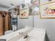 Bright bathroom features a large mirror, double sinks, and decorative accents at 1302 Eddie Craig Ct, Mcdonough, GA 30252