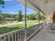 Spacious front porch with rocking chairs provides a welcoming neighborhood view at 1302 Eddie Craig Ct, Mcdonough, GA 30252