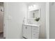 Bathroom featuring a vanity with sink, faucet, mirror, and modern lighting fixtures at 4282 Worth Nw St, Acworth, GA 30101