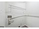 Small utility room with plumbing, electric outlets, and wire shelving for storage at 4282 Worth Nw St, Acworth, GA 30101