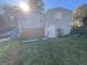 Exterior home view featuring visible damage, boarded windows, and general disrepair at 305 Fairburn Nw Rd, Atlanta, GA 30331