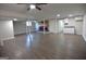 Finished basement showcasing a brick fireplace, modern flooring, and a wet bar at 2647 Mount Carmel Rd, Hampton, GA 30228