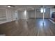 Finished basement featuring modern flooring, a fireplace, and natural light at 2647 Mount Carmel Rd, Hampton, GA 30228