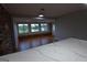 Bright living room with hardwood floors and bar area with quartz countertops at 2647 Mount Carmel Rd, Hampton, GA 30228