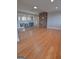 Open living room with hardwood floors and bar area, great for entertaining at 2647 Mount Carmel Rd, Hampton, GA 30228