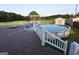 Enjoy outdoor living with a well-maintained above-ground pool and surrounding deck, offering a private oasis for relaxation at 2647 Mount Carmel Rd, Hampton, GA 30228
