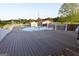 Above ground pool with a spacious deck, perfect for summer fun and relaxation with Gathering and friends at 2647 Mount Carmel Rd, Hampton, GA 30228