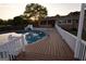 Enjoy this pool with a spacious deck, perfect for outdoor relaxation and entertaining, with a great view of the backyard at 2647 Mount Carmel Rd, Hampton, GA 30228