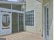 Comfortable porch area with wooden deck, and a screened entry offers a peaceful outdoor space at 187 Eagles Club Dr, Stockbridge, GA 30281