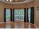 Cozy bedroom features a trey ceiling and large windows offering ample natural light at 187 Eagles Club Dr, Stockbridge, GA 30281