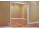 Bright hallway features hardwood floors, fresh paint and white trim throughout at 187 Eagles Club Dr, Stockbridge, GA 30281