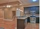 Bright kitchen showcases a breakfast bar with stainless steel appliances and stylish pendant lighting at 187 Eagles Club Dr, Stockbridge, GA 30281