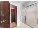Hall bathroom featuring a tub-shower combo with sliding glass doors at 75 Antioch Rd, Mcdonough, GA 30252