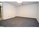 Unfurnished basement room with carpeted floor and natural light, ready for customization at 830 Montego Sw Way, Lilburn, GA 30047