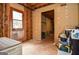 Unfinished basement space with exposed framework, a door leading outside, and potential for customization at 830 Montego Sw Way, Lilburn, GA 30047