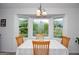 Charming breakfast nook with a bay window offering outdoor views at 830 Montego Sw Way, Lilburn, GA 30047