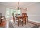 Bright dining area with a bay window that provides natural light at 830 Montego Sw Way, Lilburn, GA 30047