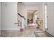 Inviting foyer with tiled floors and stairs leading to the upper level at 830 Montego Sw Way, Lilburn, GA 30047