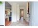 Inviting foyer featuring tile flooring, staircase, and doorway to the adjacent living room at 830 Montego Sw Way, Lilburn, GA 30047